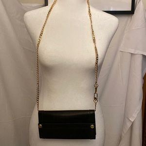 gucci wallet , pre loved, minor scratches, will be beautiful with a chain,